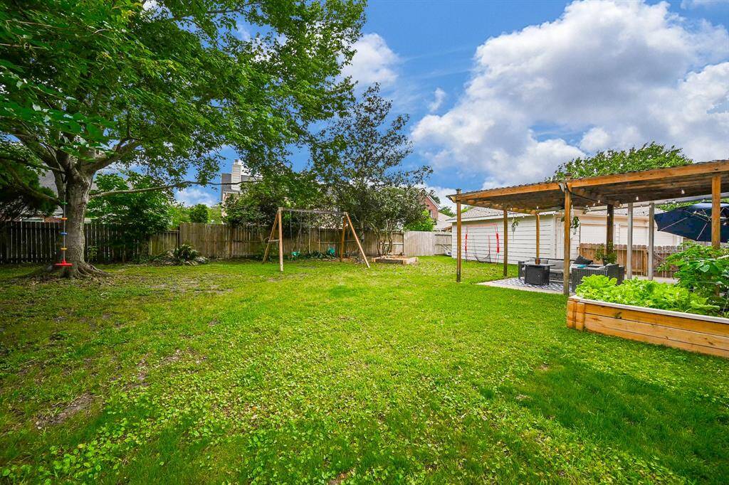 This large patio has a large trellis