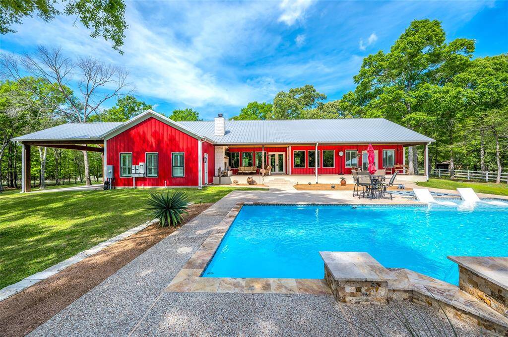 Waterfront compound on 6.566 acres with direct access to Lake Conroe.