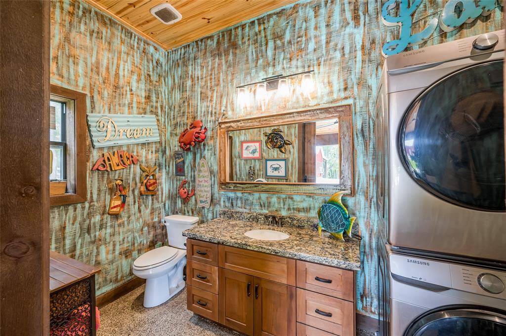 Pavilion with a half bath and washer/dryer.