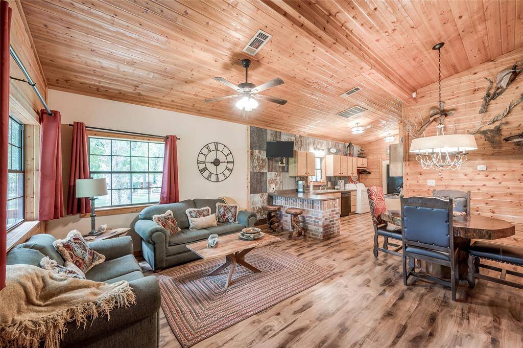 Living room, kitchen, and breakfast room.