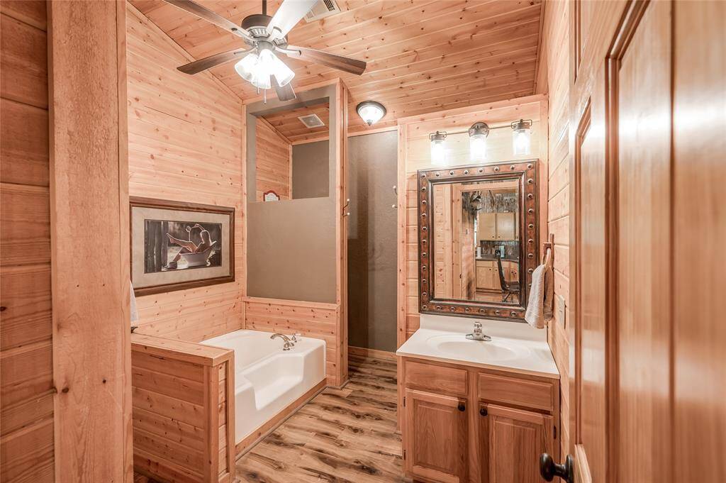 Very spacious full bathroom with an oversized soaking tub.