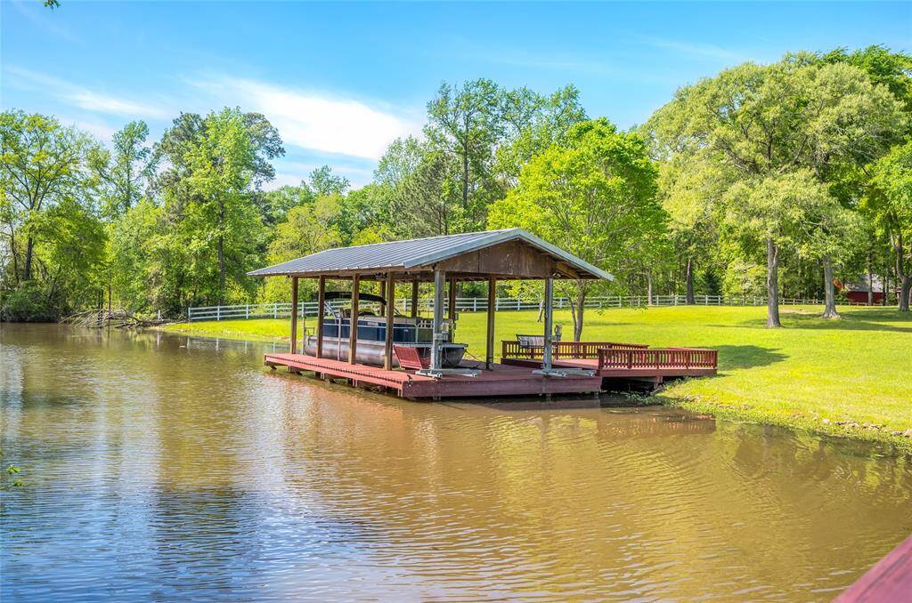 The private boat dock is equipped with boat lifts and jet ski lifts.