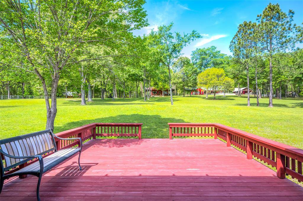 Additionally, there is a spacious boat dock patio that looks up toward the back of the home and the property.