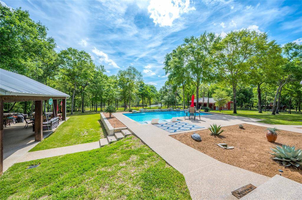 Private boat dock with boat lift and jet ski lifts.