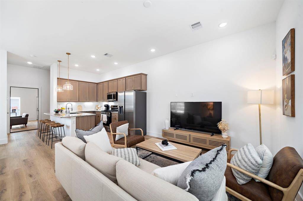 Photos are representative of another completed unit in the same community.
