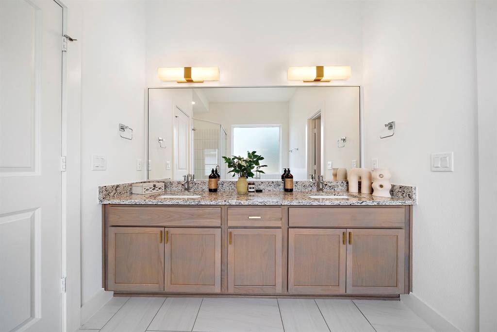 Photos are representative of another completed unit in the same community.Countertops will be white quartz.
