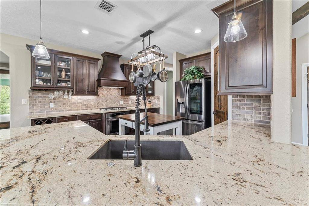The kitchen has so much storage and counter space to meal prep or make holiday dinners.