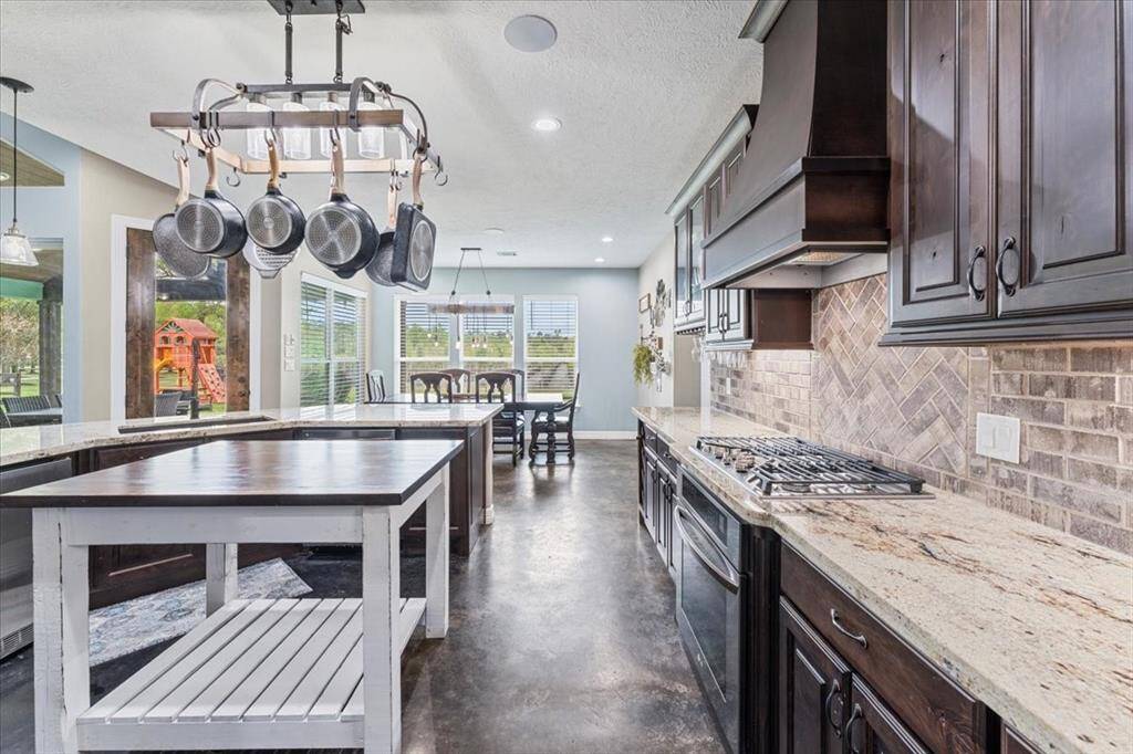 Lot of extras prep space in this kitchen!