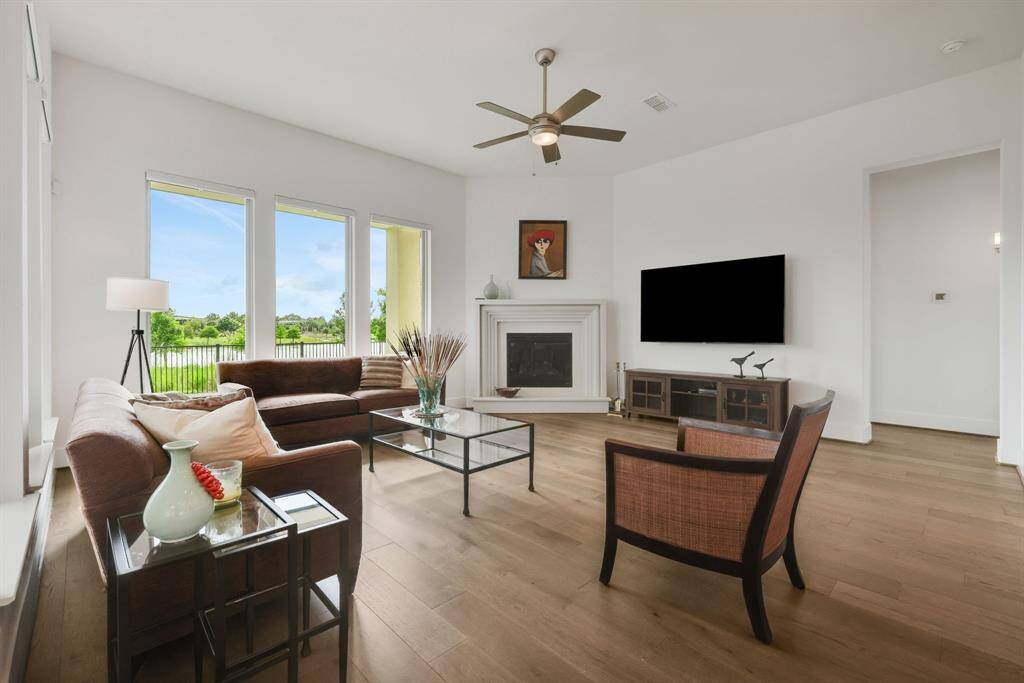 The family room offers a 7" raised cast stone Manhattan fireplace.