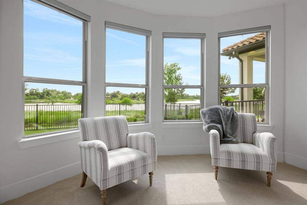 You will love the Bay window in primary bedroom providing additional space and lake viewing