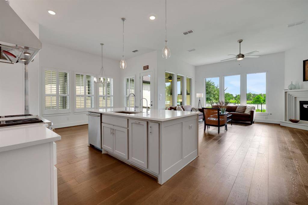 There is so much natural light and views of Dragonfly Lake from the kitchen and family room.