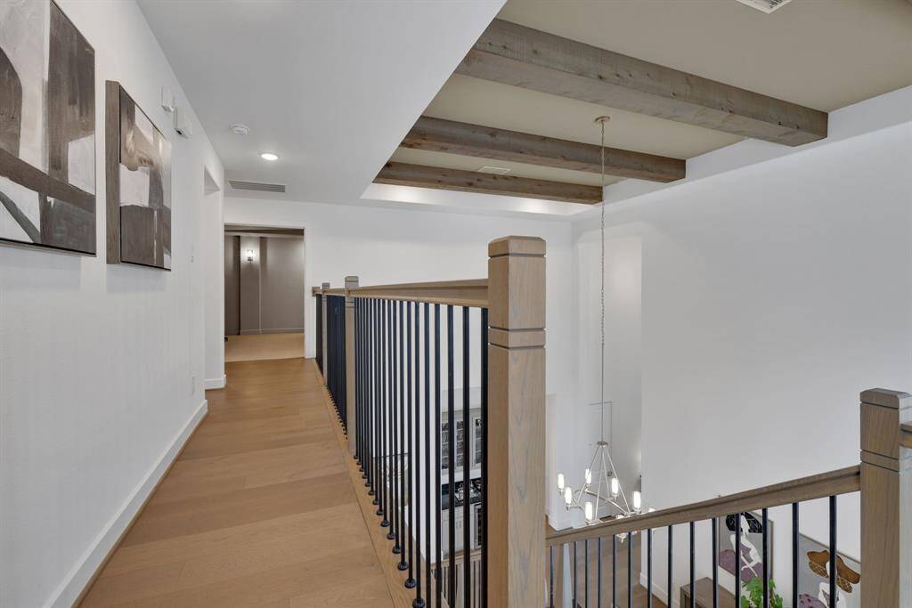 Stunning wood beams create a unique design and added elegance.