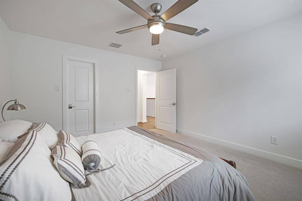 The secondary bedrooms are complete with ceiling fans.
