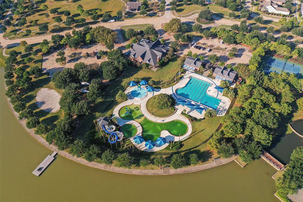 The Bridgeland welcome center and one of the many pools offered in the community.