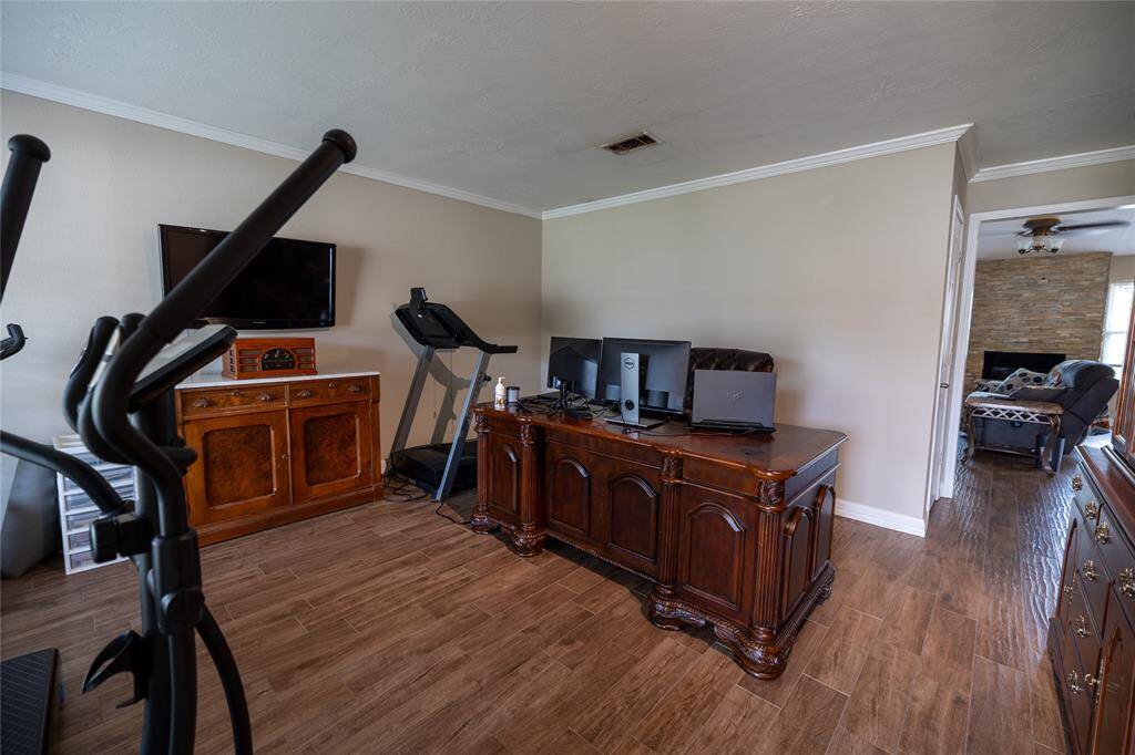 Step into the home and you are greeted by the flex room. The owners here have it as an office.
