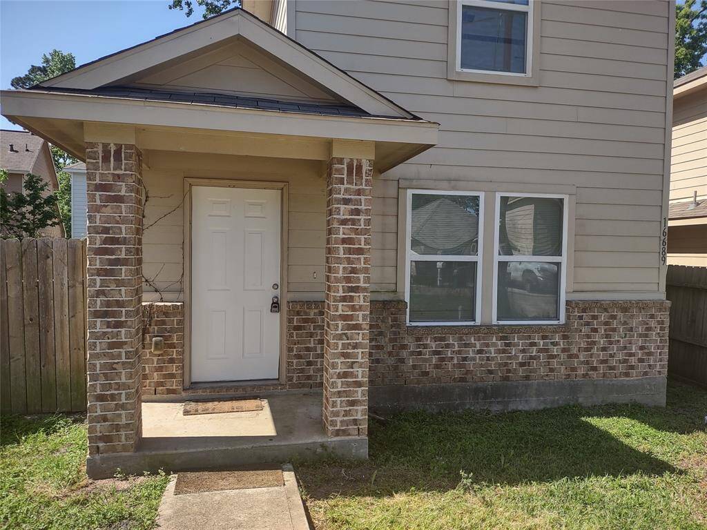 Enjoy a covered front porch to welcome guests