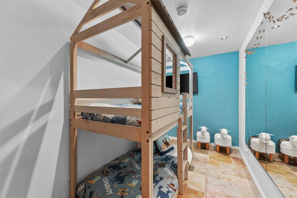 A bunk room tucked away, perfect for sleepy kids after a long day outdoors.