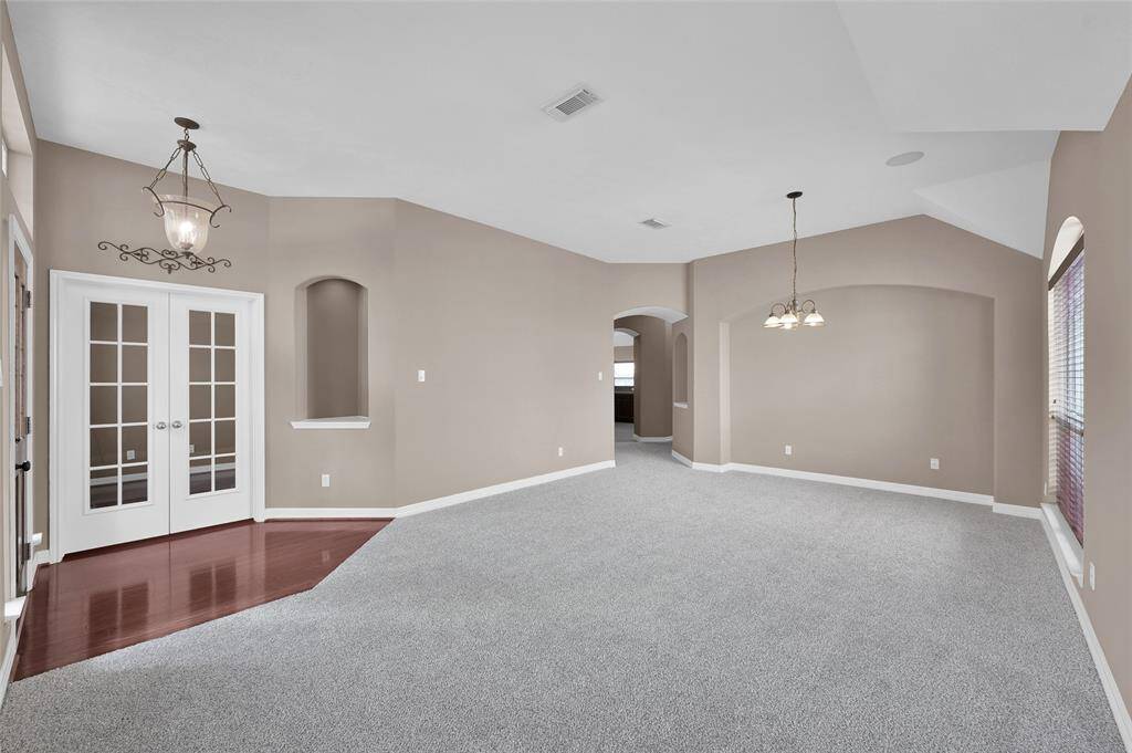 Dining and living area (Glass French doors leads to the study)