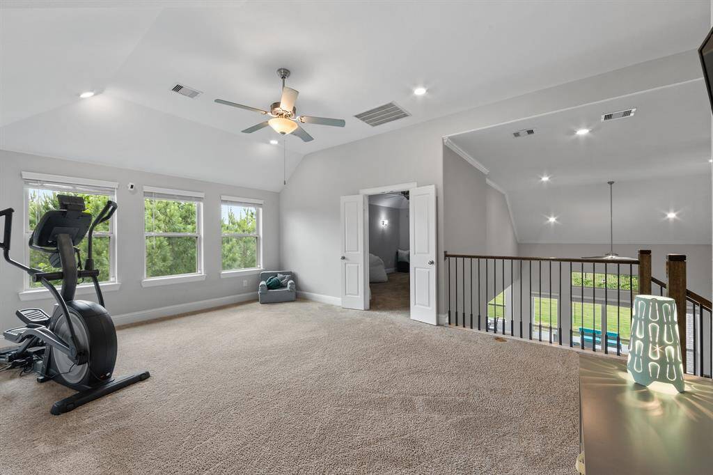 Upstairs, you'll find large secondary bedrooms, each equipped with ceiling fans for added comfort. A convenient Jack and Jill bathroom connects the rooms, offering shared access with privacy and functionality for family or guests.