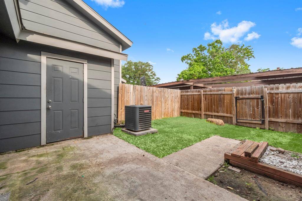Lovely backyard with storage space and fenced in.