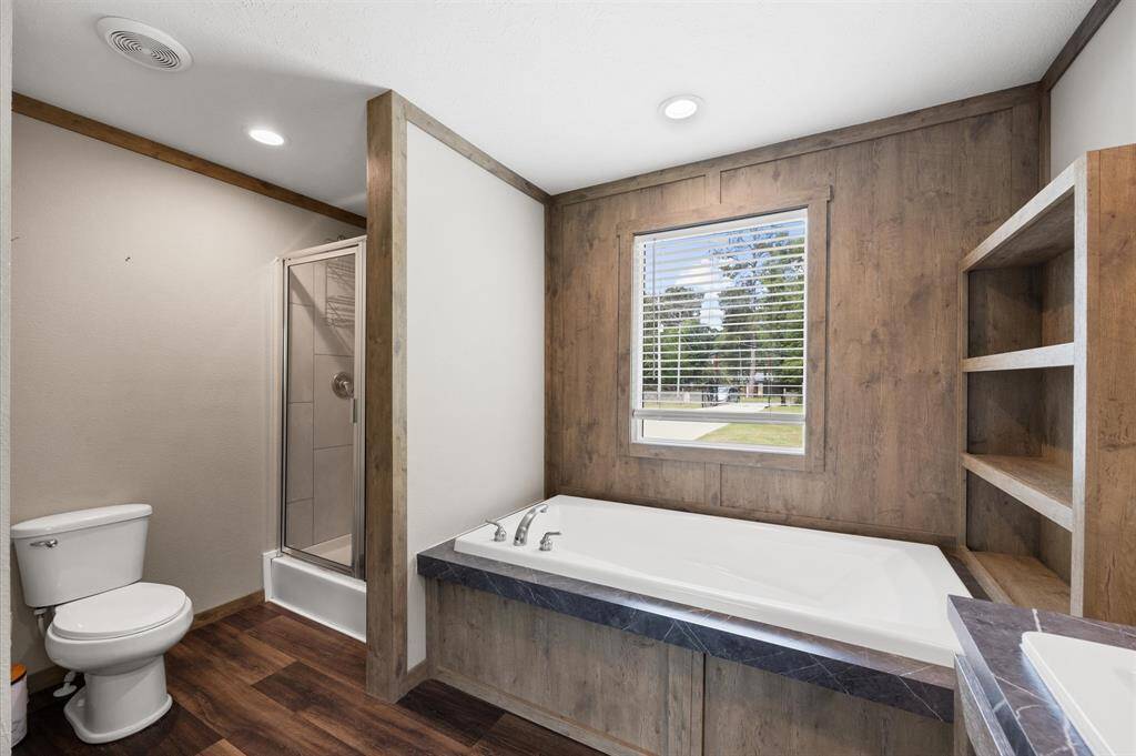 Soaking tub in primary suite