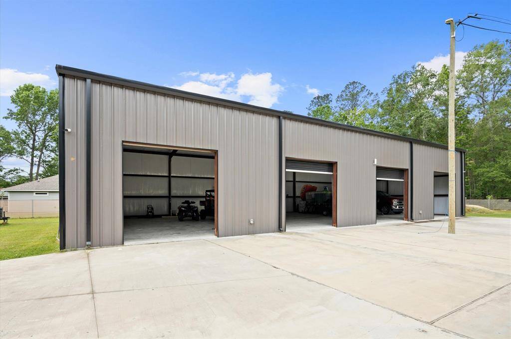 4 car garage that doubles as a workshop.