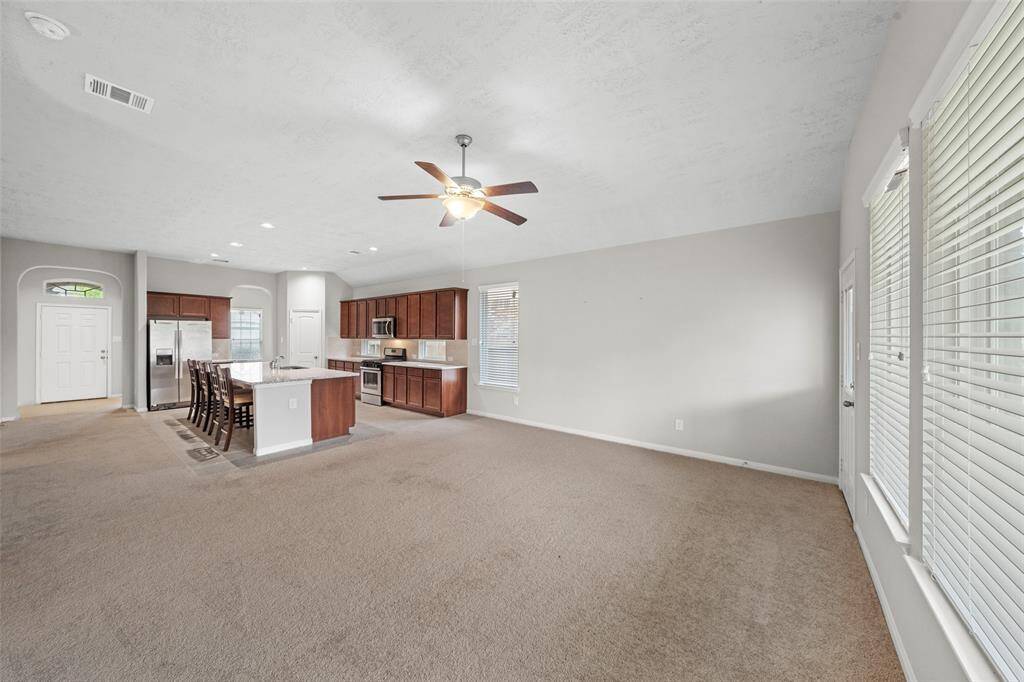 Wow!  Wow!  WOW!  Space and more space! Hard to believe all this PLUS yr private 3 bedrooms, PLUS huge Workshop in the Garage PLUS Flex Room at front of home. I have helped raise 6 kids, and what I do know, is how their needs & yours change, and This Home has A REALLY FLEXIBLE FLOOR PLAN FOR EZ LIVING & EZ EVER CHANGING NEEDS.