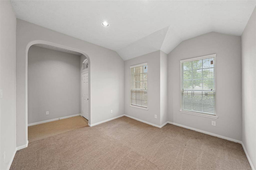 Yr Flexible Front Living Space again. looking the other way,  towards the Front Door.  LOTS Windows and light;  NICE HIGH CEILINGS - GIVES A GREAT FEELING OF SPACE AND LIGHT every where! Private area yet part of the Family!