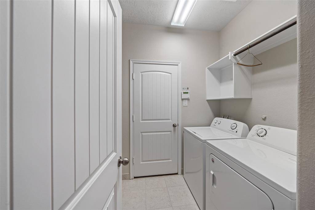 Walk thru Utility Room INSIDE THE HOUSE. always air conditioned, nice and cool, lots of storage space. Great efficient like-new AMANA Washer & Dryer set included &  ready to stay and can be included in price of home, if you want - Yr Choice!