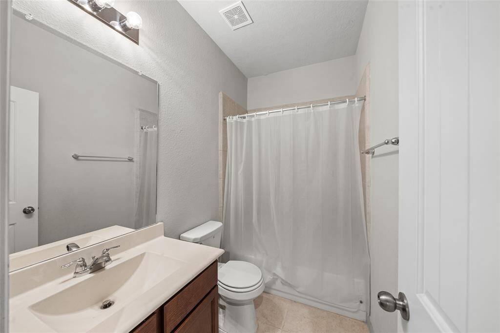 The SECOND FULL BATHROOM is ready, simple in design, yet features everything you need in a modern Bathroom. EZ clean tub and shower, next to efficient toiley, adjacent to a useful sink and storage unde - What else is there?