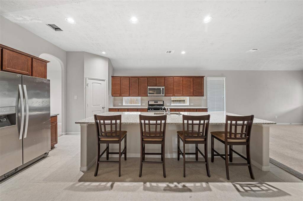 Experience modern living with this affordable, spacious home. Featuring a functional kitchen perfect for family meals, it offers low utility costs and ample private rooms. Enjoy the convenience of easy cooking, serving, and cleaning in a space designed for happiness and comfort. NEVER FLOODED - safe in Zone "X"
