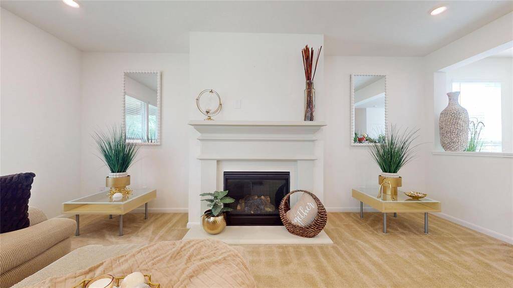The living room also boasts a cozy gas log fireplace, where you will spend many hours enjoying the comfort of your home on chilly nights.