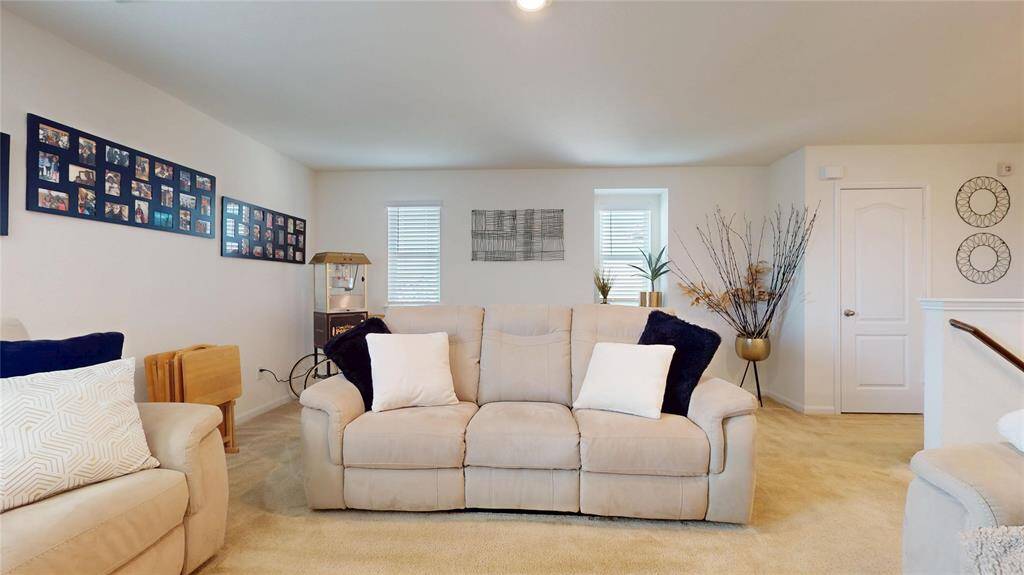 Turn this carpeted, spacious area on the 2nd floor into a media hangout! Creating a comfortable, relaxing space.