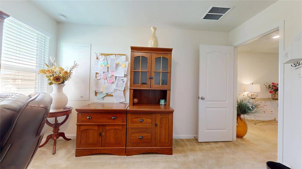 Secondary bedroom gets great natural light and easily accesses hallways on the second floor.