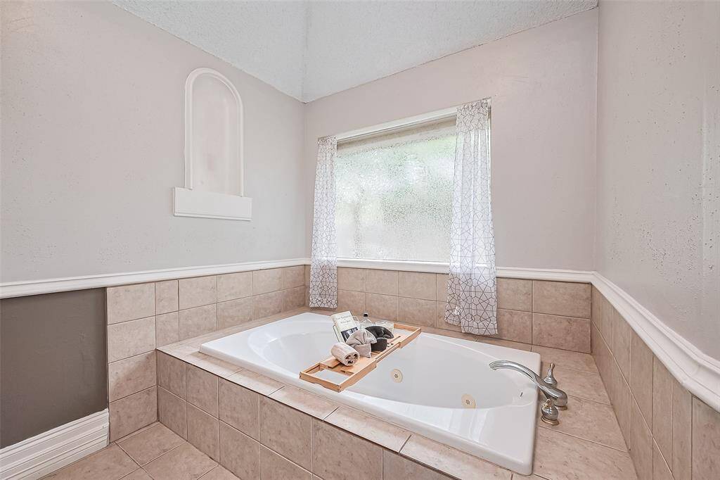 Soak the days cares away in your luxurious jetted tub.