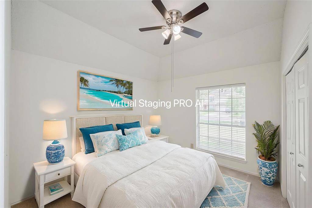 Tall ceilings continue into bedroom 3 which also has a large window and big closet.
