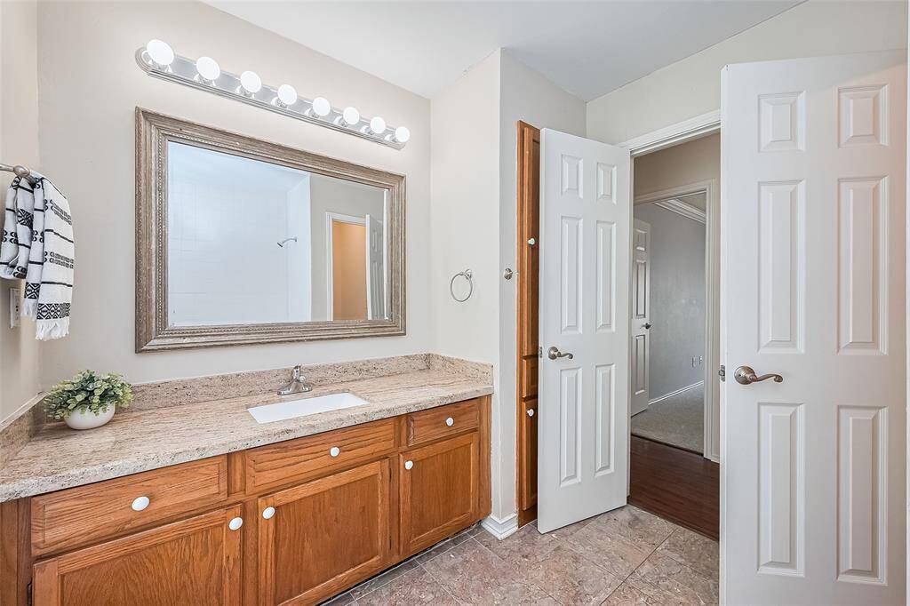 Thoughtful storage throughout the house, bathroom 2 includes a linen/laundry closet. There is also a private toilet room to the right.