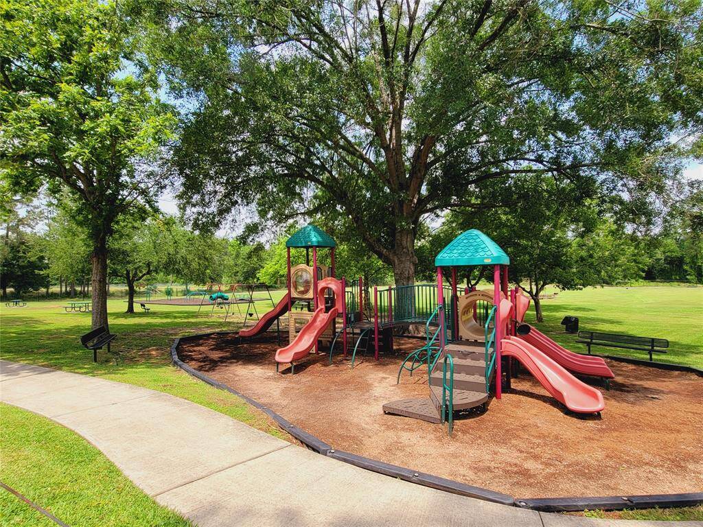 Gated park with playgrounds and walking trails.