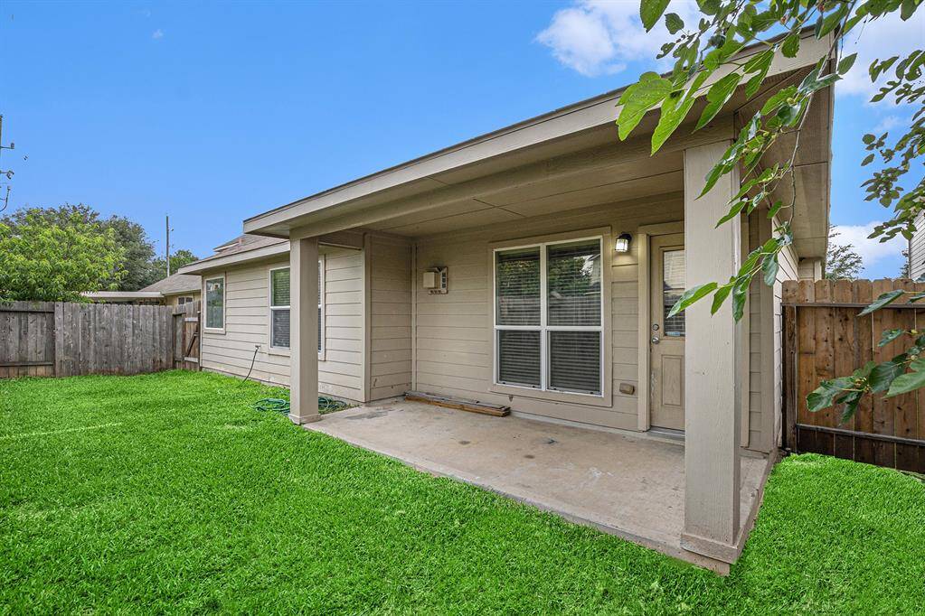 Covered Porch and Backyard