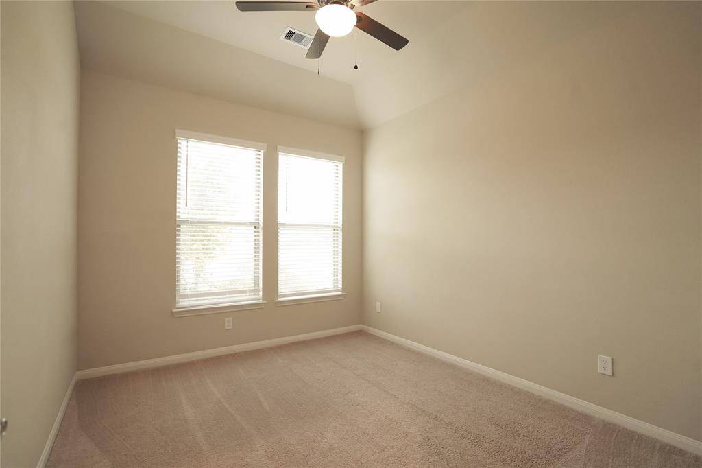 secondary bedroom 1 with bathroom on left side front.