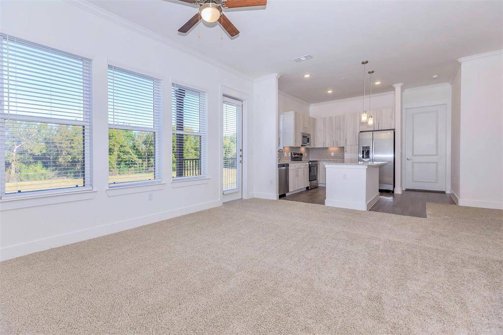 Window over kitchen sink, open layout with tons of natural light
