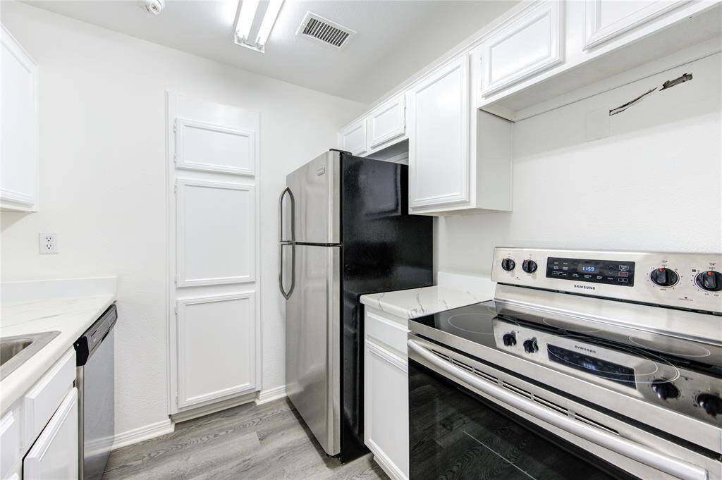 This freshly painted white kitchen offers a clean, timeless look that feels both inviting and sophisticated. The crisp white cabinetry enhances the sense of space and light, while stainless steel appliances add a sleek, modern touch. Designed for both function and style, this kitchen is ready for everything from casual mornings to gourmet meals. Contact me today for more details or to schedule a tour.
