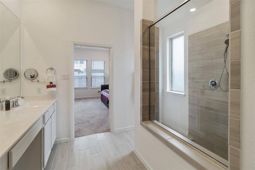 The upgraded shower compliments this bathroom perfectly.