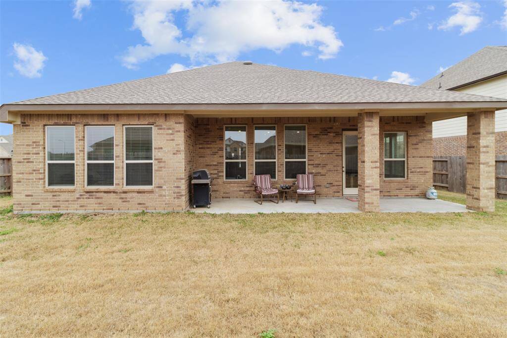 Check out the perfect back patio equipped with a gas connection and covered area.