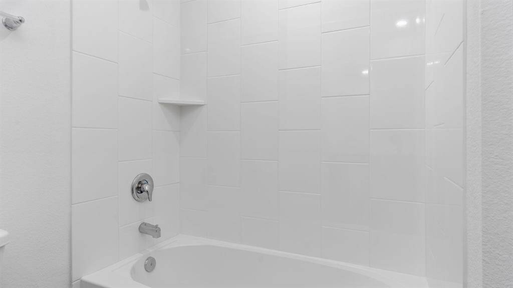 guest bathroom with tub only