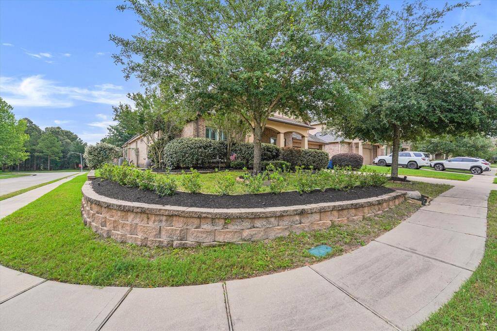 Prime corner lot offering great curb appeal. A perfect blend of space and convenience for your dream home!