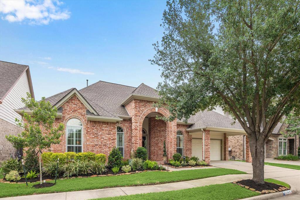 This stately brick home is nestled in a cozy "subdivision" with no through streets, and is zoned to Oak Forest Elementary.