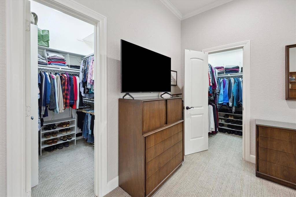 The primary suite also has two exceptional walk-in closets.