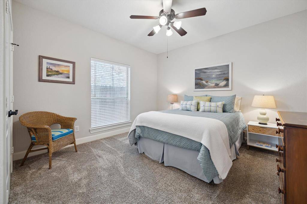 The first of two guest bedrooms is quite spacious with a generous closet.  This is a queen size bed and the room could certainly accommodate a king.
