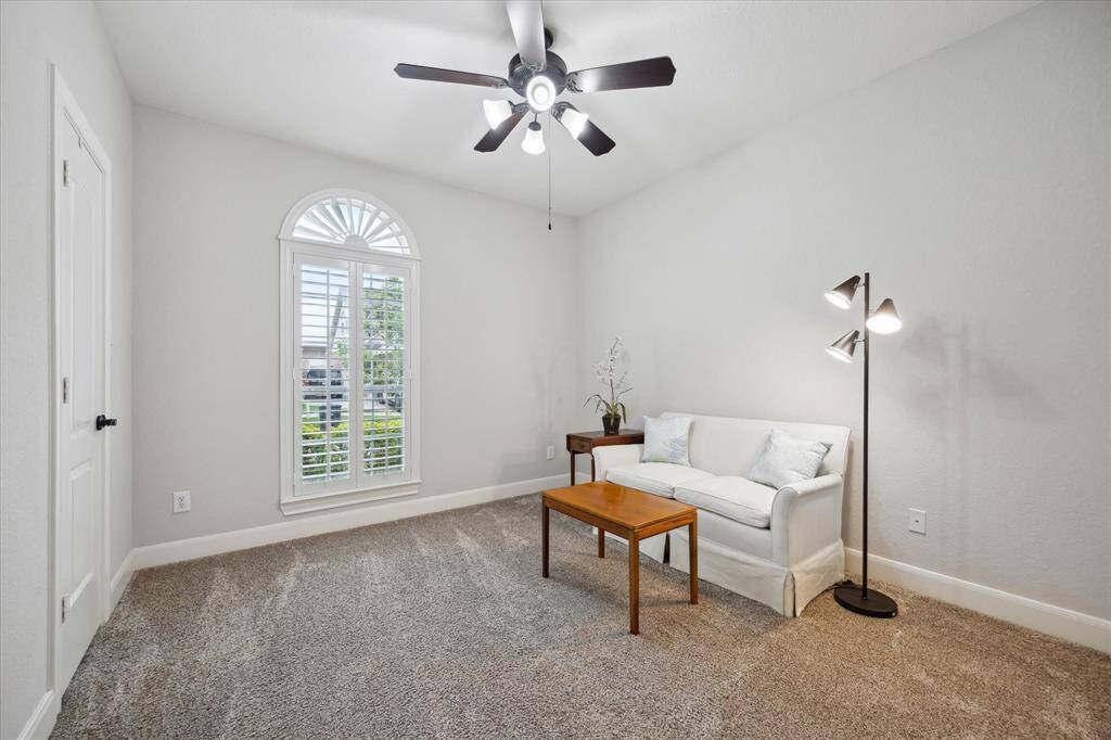 The third bedroom looks out onto the landscaped front yard, and also has a sizeable closet.